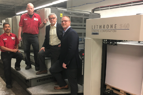 Pictured from left to right. Mohamed Pasha and Will Hagen Press crew, Brett Rogers from Komcan Inc and Gottfried Hildenbrand Founder and General Manager of Swiss Print International.