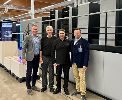 Chris Travis, Koenig & Bauer; Franco Trevisan, Mega&rsquo;s lead pressman; Marco Macri, Emballages Mega Packaging&rsquo;s CEO; and Aleks Lajtman, Koenig & Bauer&rsquo;s Canada ; at the factory in front of new Rapida 106 six-colour UV press plus coater