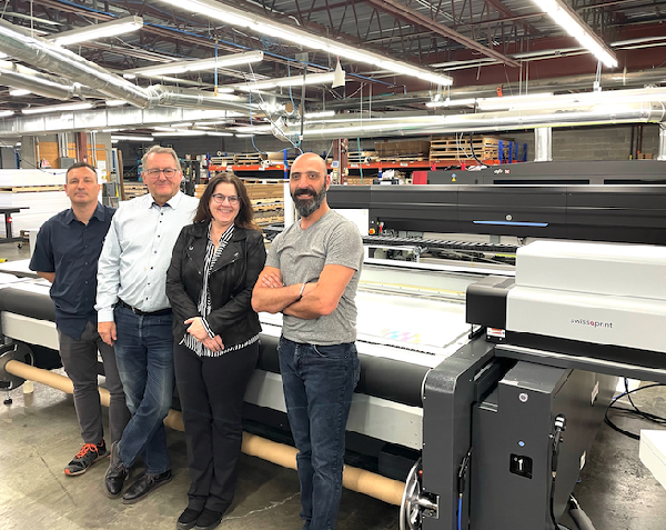 left to right: François Allard, Daniel Lefevre, Lucie Carbonneau, and Samir Mardini with their new swissQprint Nyala 4 flatbed printer.