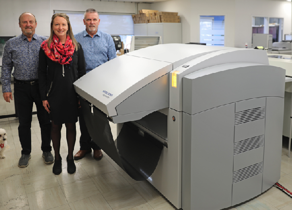 L to R: Abby, Doug Kletke, Pam Kletke, Dave Kletke, with new Suprasetter A75